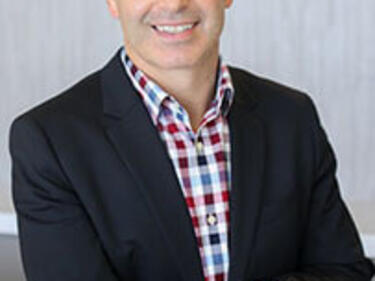 Manny Figueiredo smiling